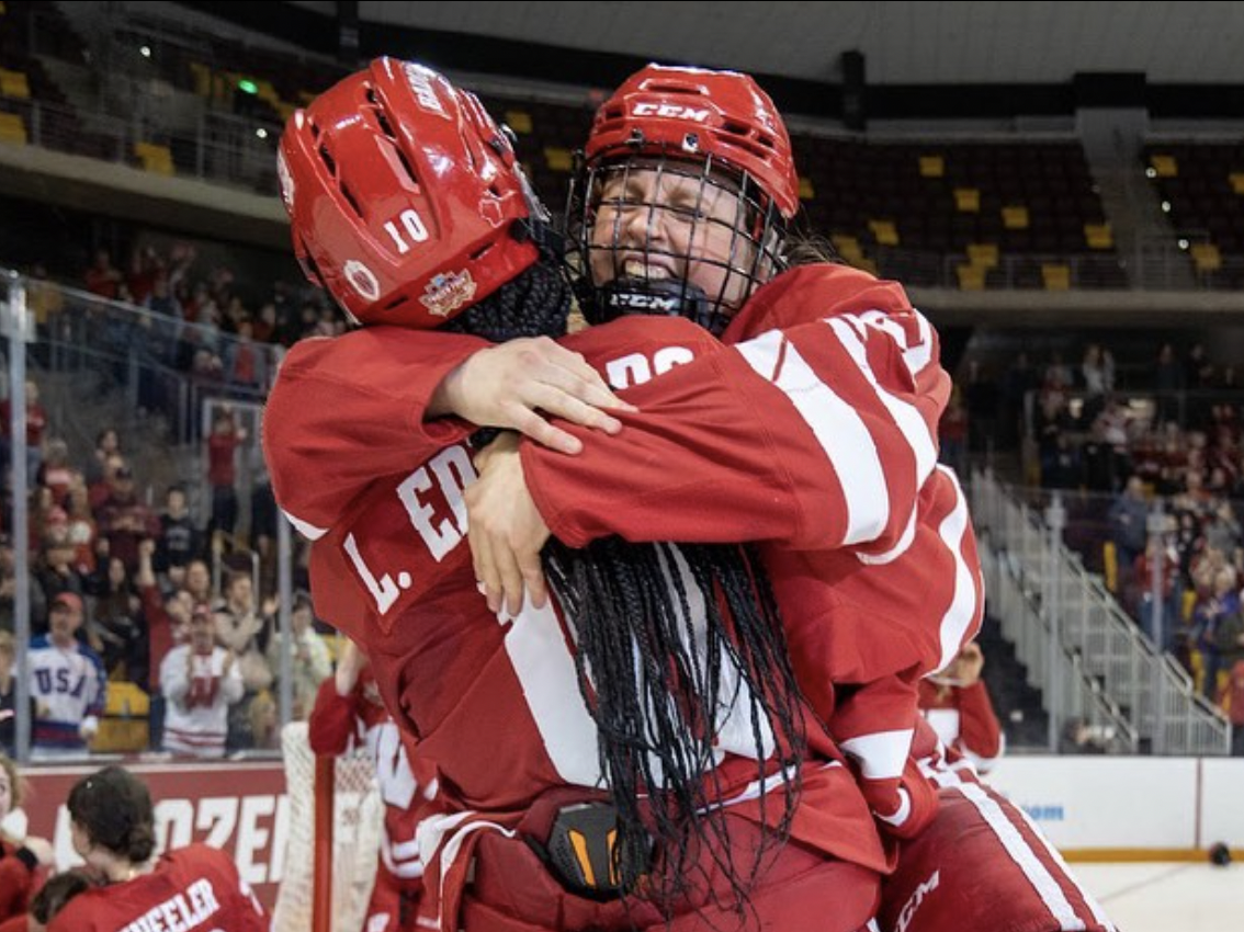 Simms celebrates with her University of Wisconsin teammate after their 2023 NCAA National Championship win against Ohio State University.